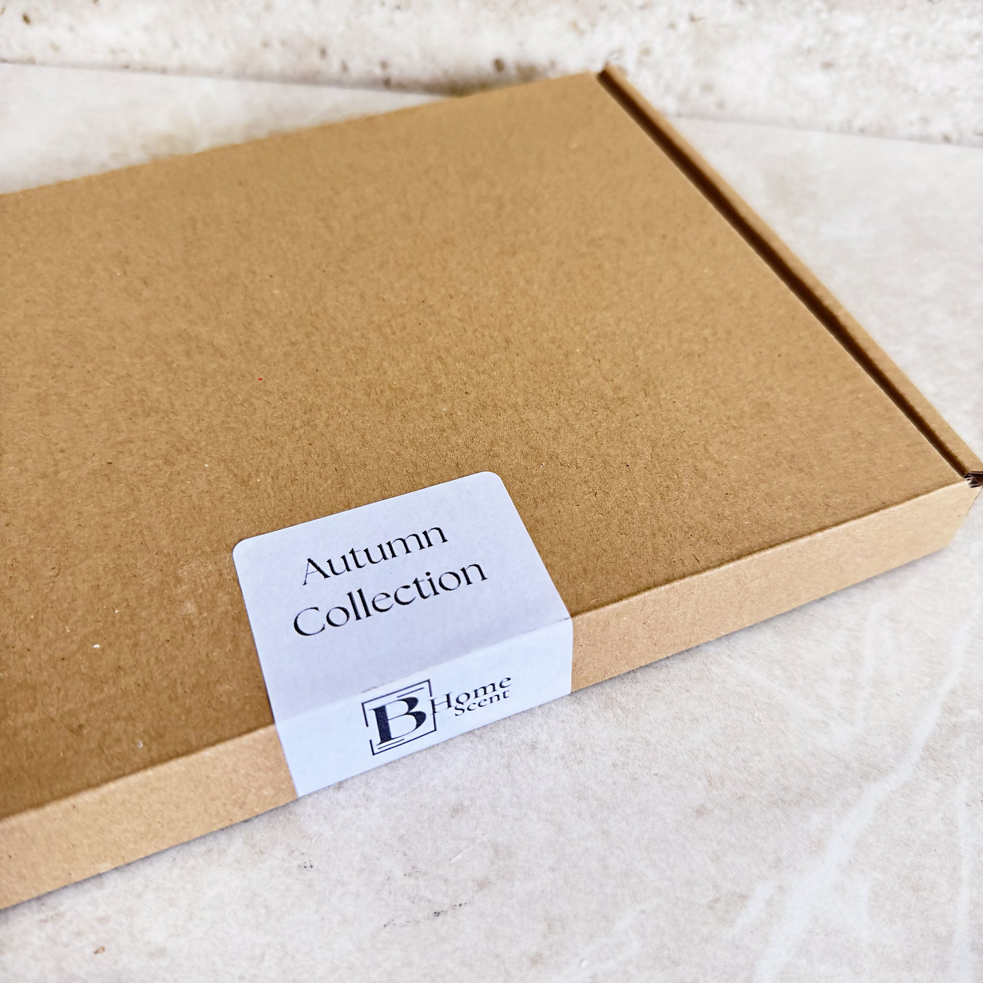 Kraft gift box with BHOMESCENT label reading Autumn Collection, packaging for the Autumn Wax Melt Snap Bar Collection