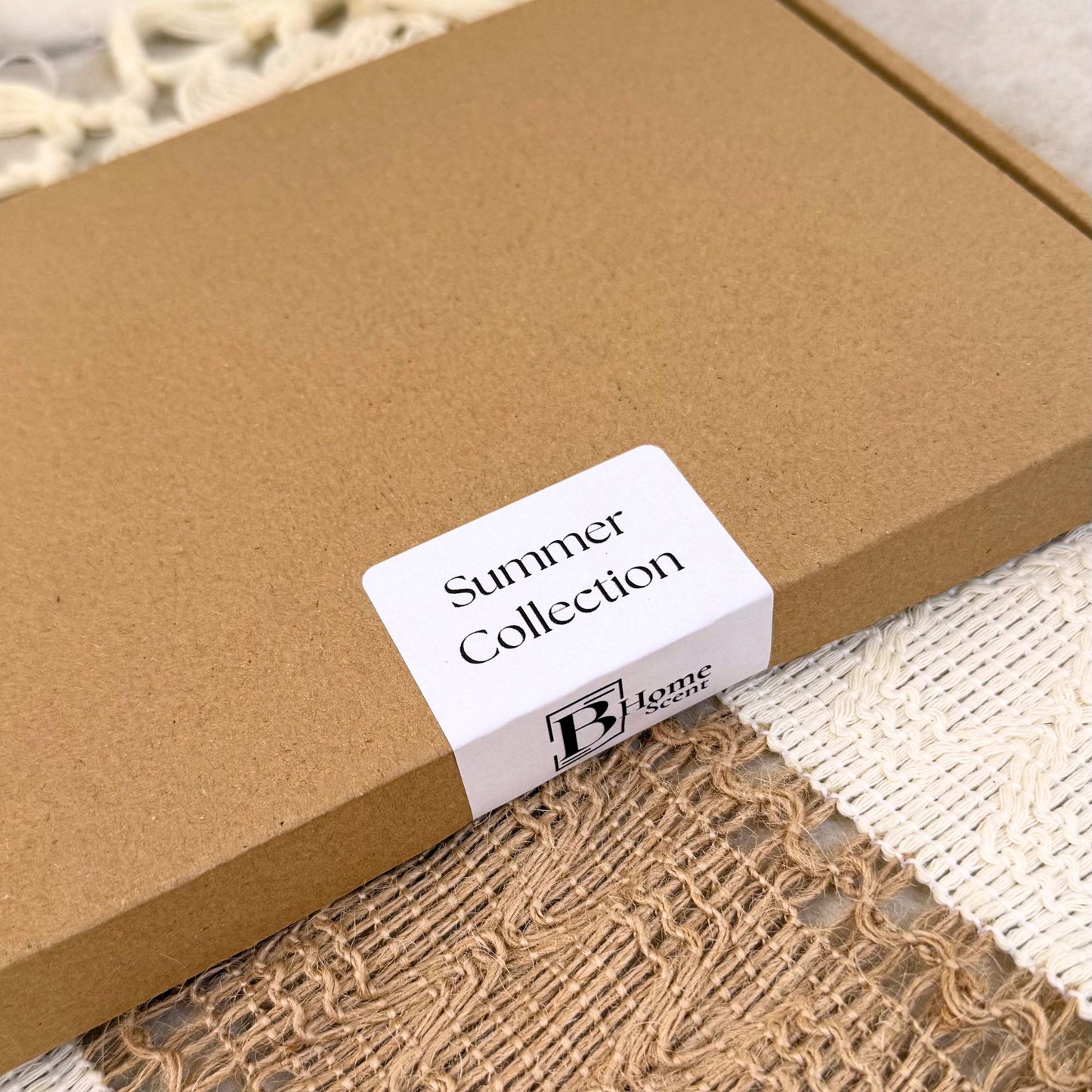 Summer wax melt snap bar collection Brown box with a 'Summer Collection' label on a textured surface