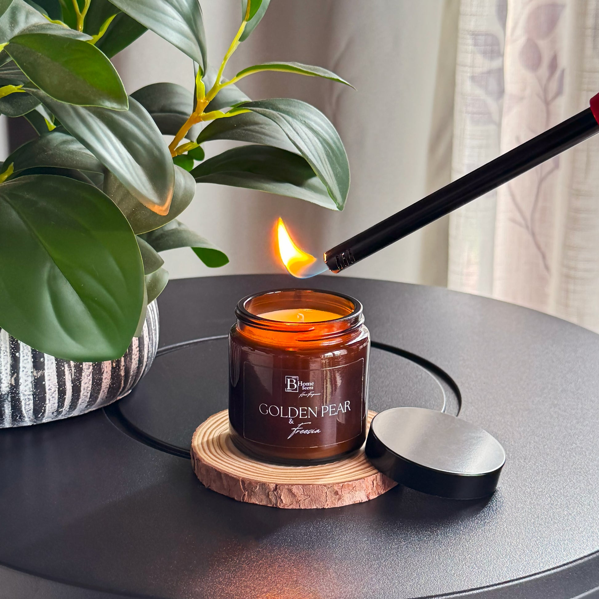 Golden Pear and Freesia Scented Candle- Lighting amber candle UK with golden pear fragrance, home decor setup