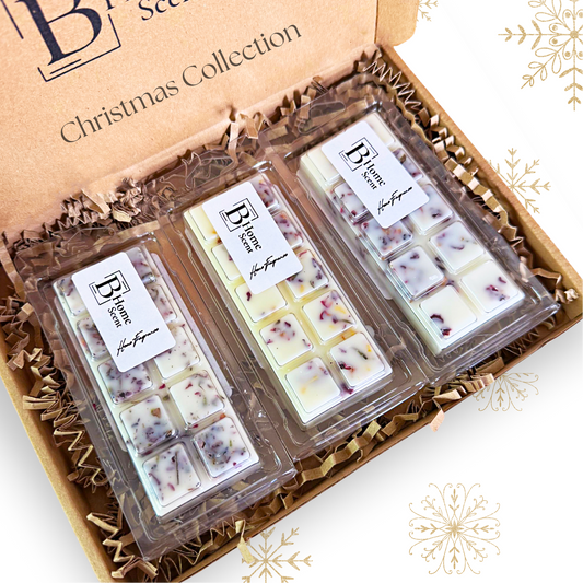 Box of Christmas wax melt snap bar Collection wax melts on a white background